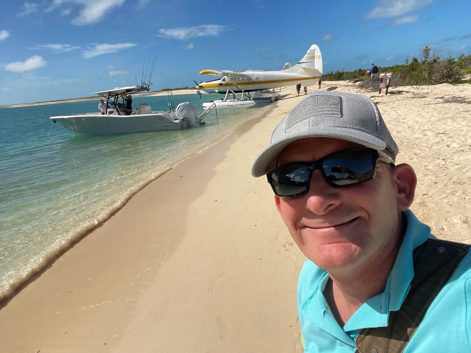 Arnie on the beach at Dry Tortugas, a seaplane in the background