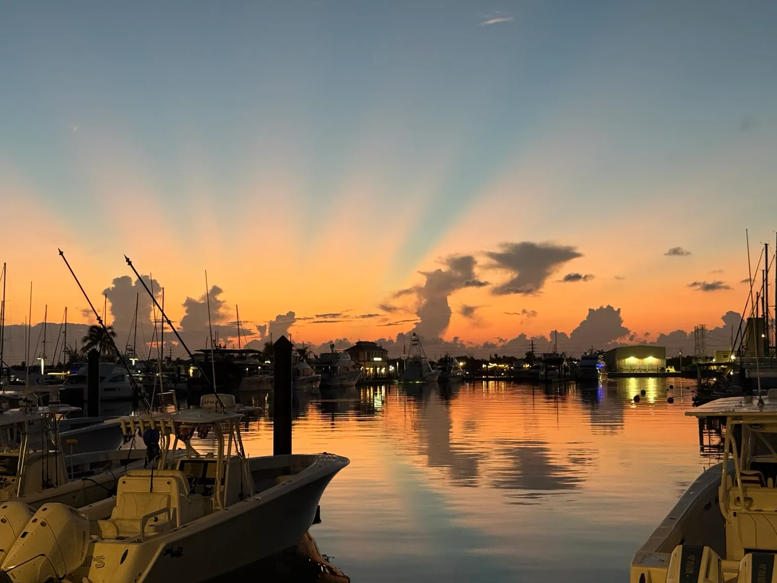 Sunrays over the marina at sunset